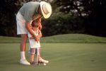  Playing golf -   